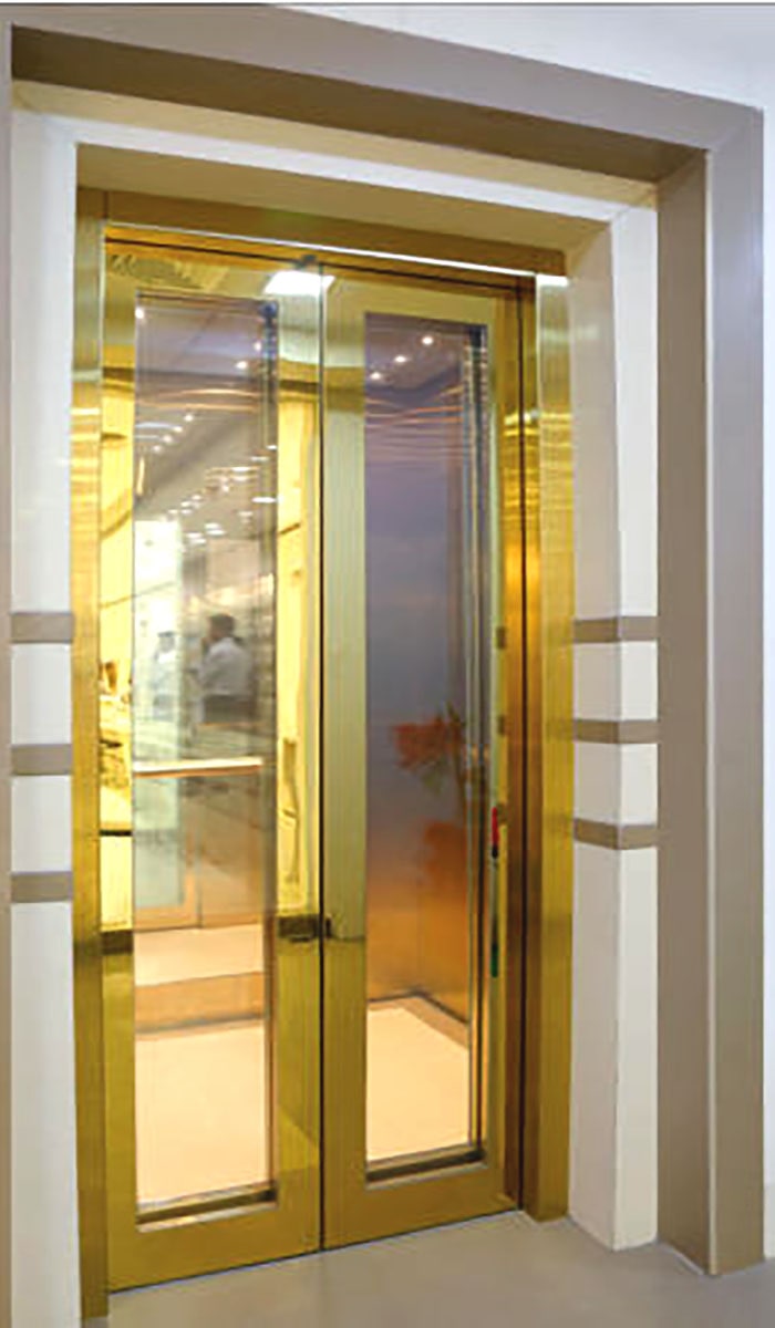 درب آسانسور استیل و شیشه طلایی از پریسما